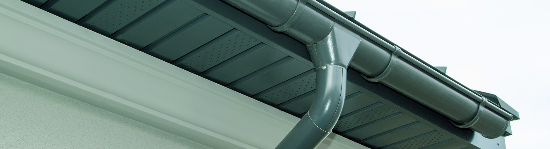 close up of a new black pvc gutter waynesville nc